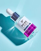 Picture of the IT Cosmetics Bye Bye Lines Hyaluronic Acid Serum on a blue background