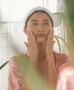 Picture of a model washing their face