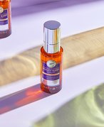 Two bottles of the IT Cosmetics Confidence in Your Beauty Sleep Serum on a table top.