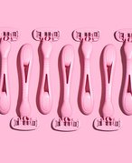 A picture of multiple pink razors on a pink background