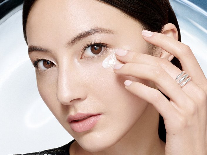 A person with a lotion cream on their face