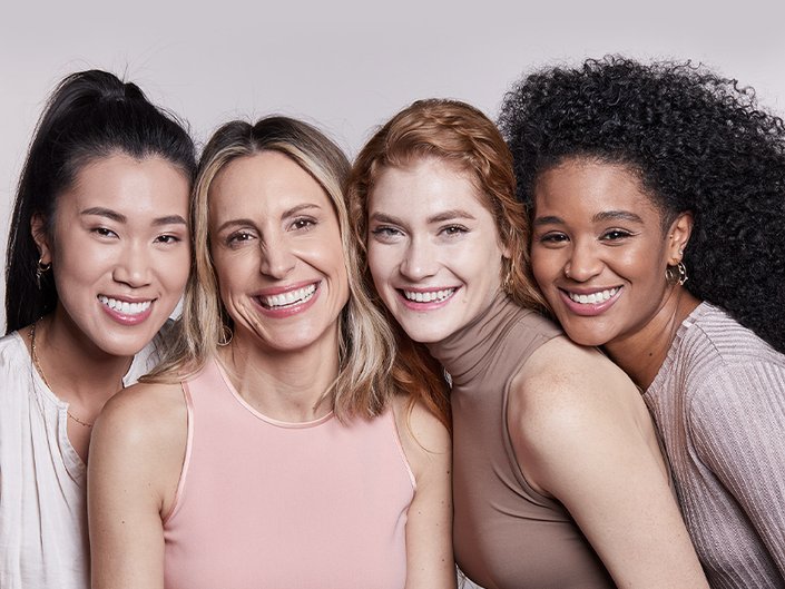 4 women with different skin tone complexions