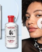 Person applying toner to their cheek