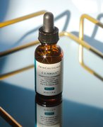 SkinCeuticals C E Ferulic With 15% L-Ascorbic Acid on a mirrored tray